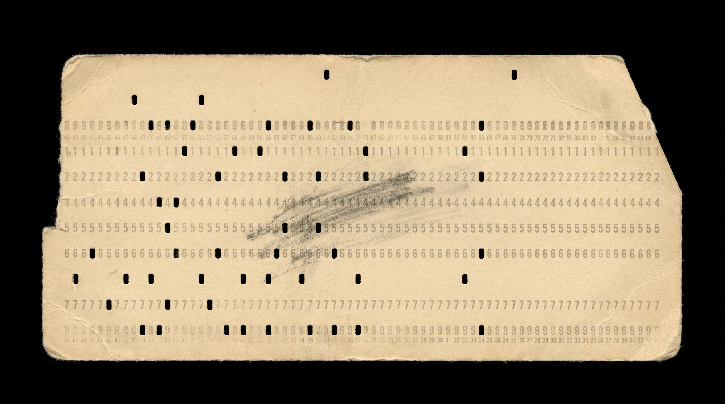 A punch card, rows of holes catching light against a black scanner background.